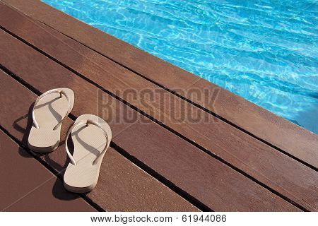 Flip Flops By The Swimming Pool