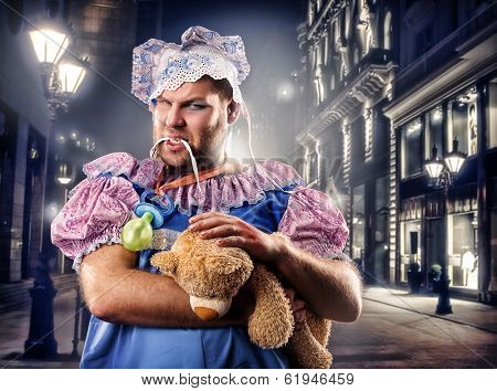 Chav man weared as baby