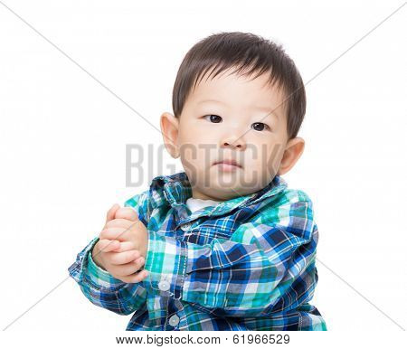 Asian baby boy claping hand