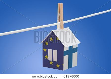 Finland and EU flag on paper house