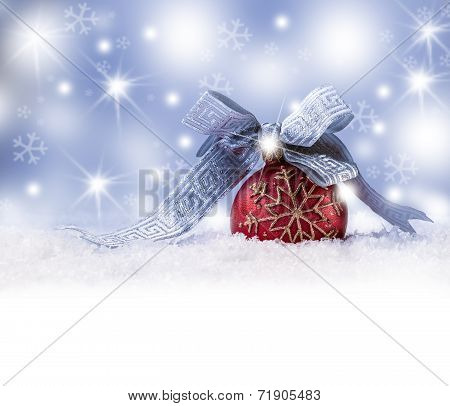 Christmas ball,ribbon snow and space abstract background.