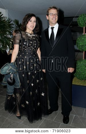 LOS ANGELES - SEP 12:  Phil Laak, Jennifer Tilly at the Mercy For Animals 15th Anniversary Gala  at London Hotel on September 12, 2014 in West Hollywood, CA