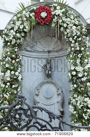 BRUSSELS, BELGIUM - SEPTEMBER 4: The famous Manneken Pis, the iconic statue of Brussels on September 4, 2014 in Brussels