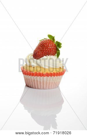 cupcake with strawberry on top