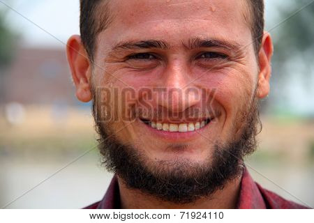 Happy and Smiling Young South Asian Male