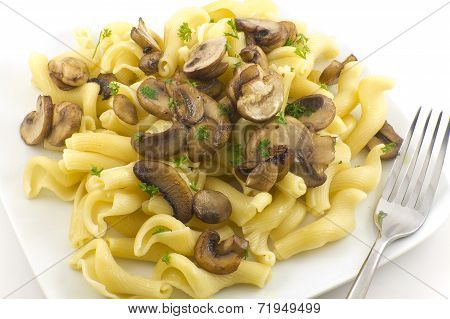 Gigli Con Funghi pasta dish with chopped parsley leaves