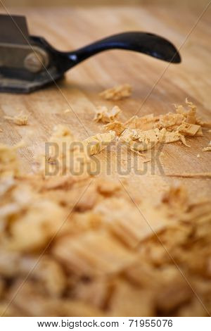 Chip Shavings with Spokeshave of Sapele Hardwood Board