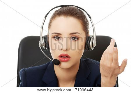 Portrait of anoyed support phone operator in headset