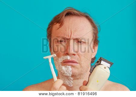 A Man To Shave Must Choose Between The Razor And The Razor-blade
