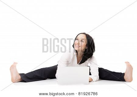 Young Office Woman With Laptop Doing Splits On White Background