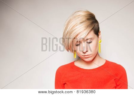 Beautiful young girl on a light background