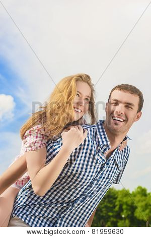 Youth Lifestyle, Summer Vacations, Dating, Love, Happiness Concepts. Happy Caucasian Couple Piggybac