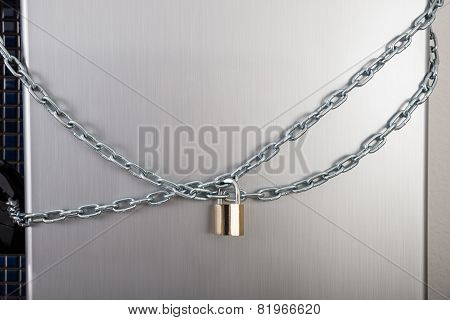 Close-up Of Locked Fridge