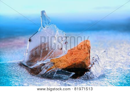 Orange Stone Breaks Through The Ice