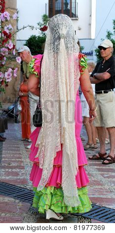 Spanish woman in traditional dress.