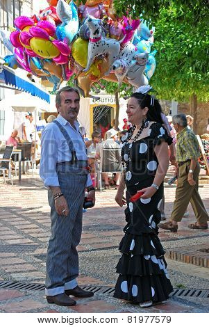 Spanish couple in traditional dress.