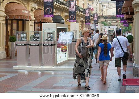 People Walking In Gum Store