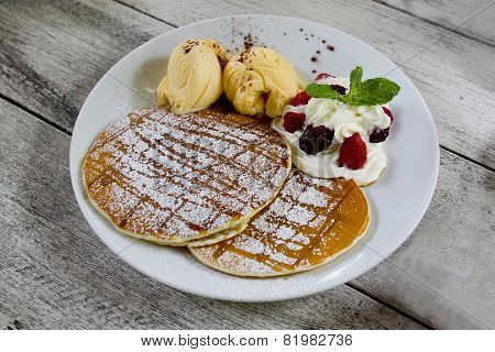 Pancakes With Vanila Ice Cream, Whipping Cream And Icezing