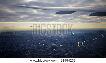 Aeriel view of Paris city and plane wing