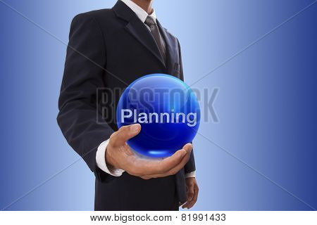 Businessman hand holding blue crystal ball