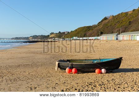 Boat on Bournemouth beach Dorset England UK near to Poole known for beautiful sandy beaches