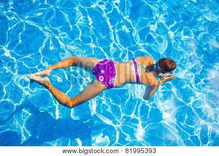 Girl in the pool