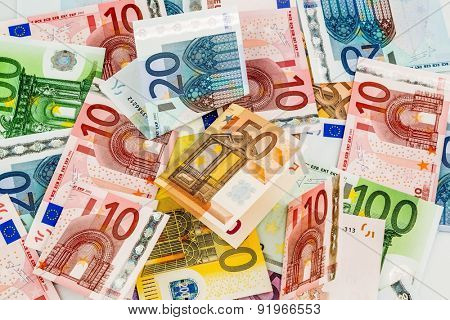 many different euro bills. symbolic photo for wealth and investment.