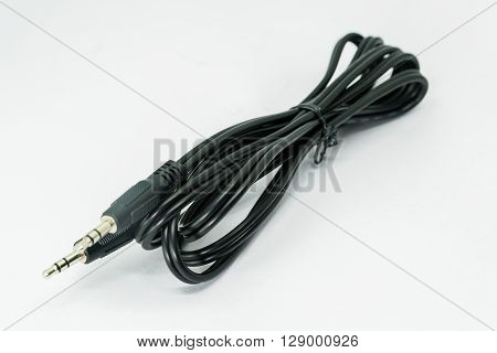 3.5mm jack plug and cable isolated on the white background