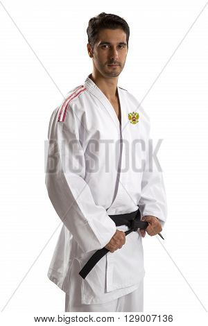 Russian judo fighter on a white background