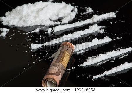 Lines of cocaine and 50 euro bill