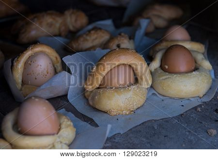 Easter eggs coverd with bread and cooked on a clay oven.