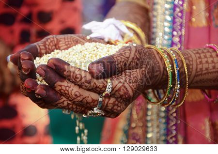 A Indian Bride Performing Indian Rituals For Her Wedding