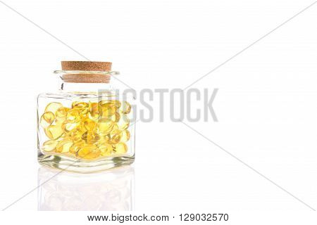 Fish Oil Capsules In Translucent Bottle On White Background