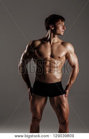 Strong Athletic Man Showing Muscular Body And Sixpack Abs. Showing His Body. Fitness Model. Great Fo