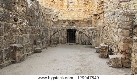Excavated archeological arch in the Pool of Bethesda and Byzantine Church.  Located in the Muslim Quarter in Old Jerusalem, Israel on the path of the Beth Zeta Valley.