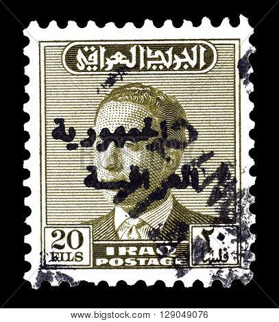 IRAQ - CIRCA 1958 : Cancelled and overprinted postage stamp printed by Iraq, that shows king Faisal II.