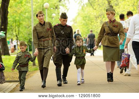 Orel Russia - May 9 2016: Celebration of 71th anniversary of the Victory Day (WWII). Family in soviet military uniform horizontal