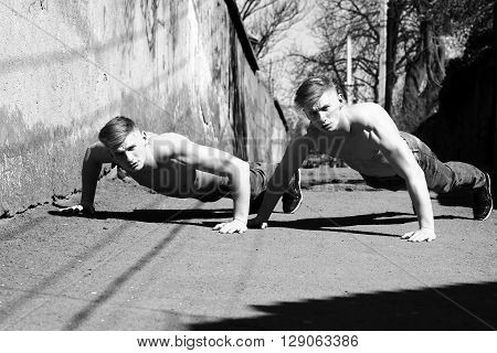 Twin Athletes Do Push-ups