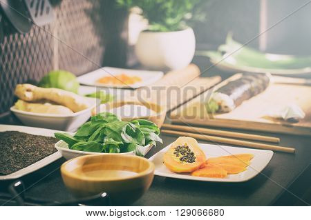 sushi roll process of making raw makki fresh seafood susi - stock image