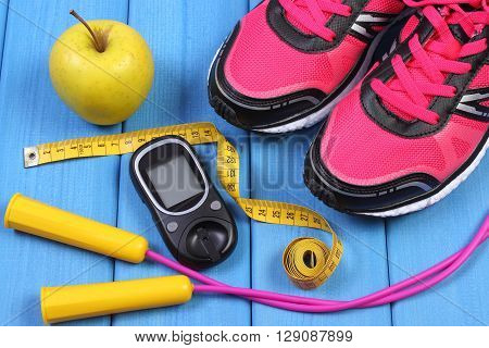 Glucose meter sport shoes apple and accessories for fitness or sport diabetes healthy and active lifestyles