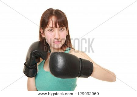 portrait of female boxer throws a left hook on white background
