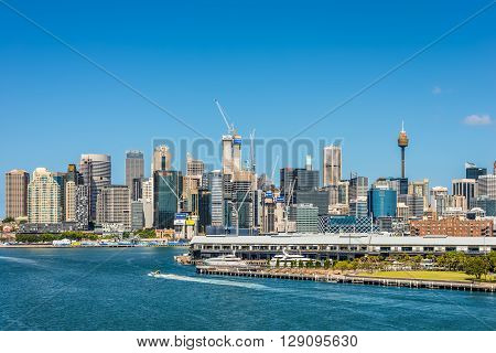 Sydney Australia - November 11 2014: Sydney's business district view from the Johnstons Bay Sydney New South Wales Australia. Barangaroo is a new part of the Sydney CBD located on the western harbour foreshore. Doltone House in the foreground.