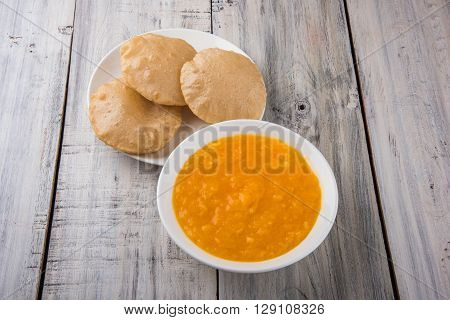 Aamras or Aam Ras Puri: Puri which is an indian fried small bread and alphonso mango pulp is a popular lunch especially during Padwa, the Marathi new year, maharashtrian lunch/dinner menu