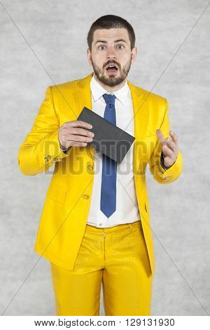 Surprised Businessman With A Bribe In Hand
