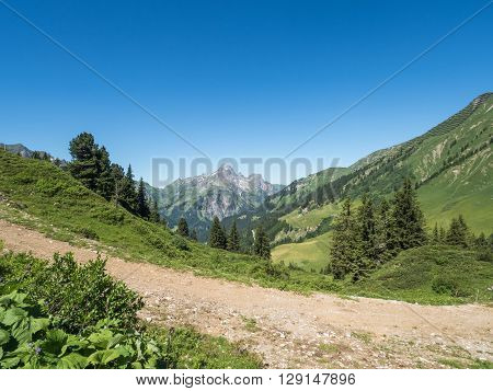 A view of Alpine mountains surrounding the village Schroecken in Bregenzerwald region Vorarlberg Austria