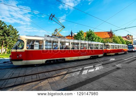 BRATISLAVA, SLOVAKIA - CIRCA APRIL 2016: Old tram with passengers on Kapucinska street in the old town of Bratislava the capital of Slovakia. Transportation in Bratislava old town