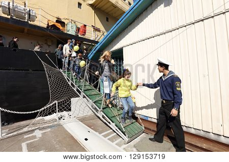 ST. PETERSBURG, RUSSIA - MAY 2, 2016: People at the oldest operating Russian icebreaker Ivan Krusenstern during 3rd Icebreaker Festival. It's unique fest dedicated to icebreaker fleet