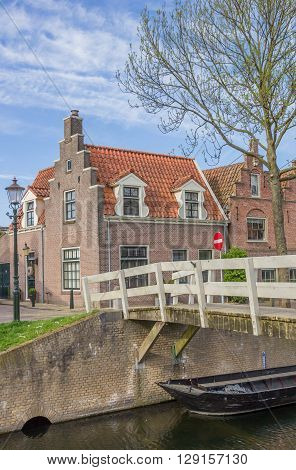 Small wooden bridge over a canal in Medemblik Netherlands