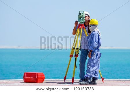 Doha Qatar - April 10 2006: Workers in a costruction site of the business area