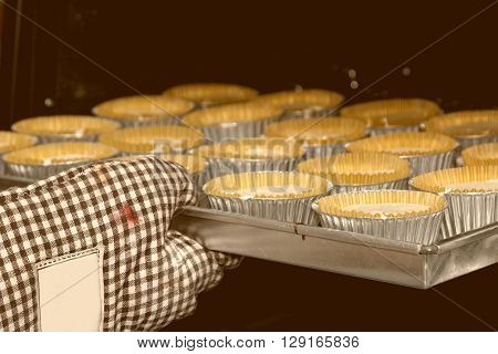 Baking homemade Cup cakes baking in oven